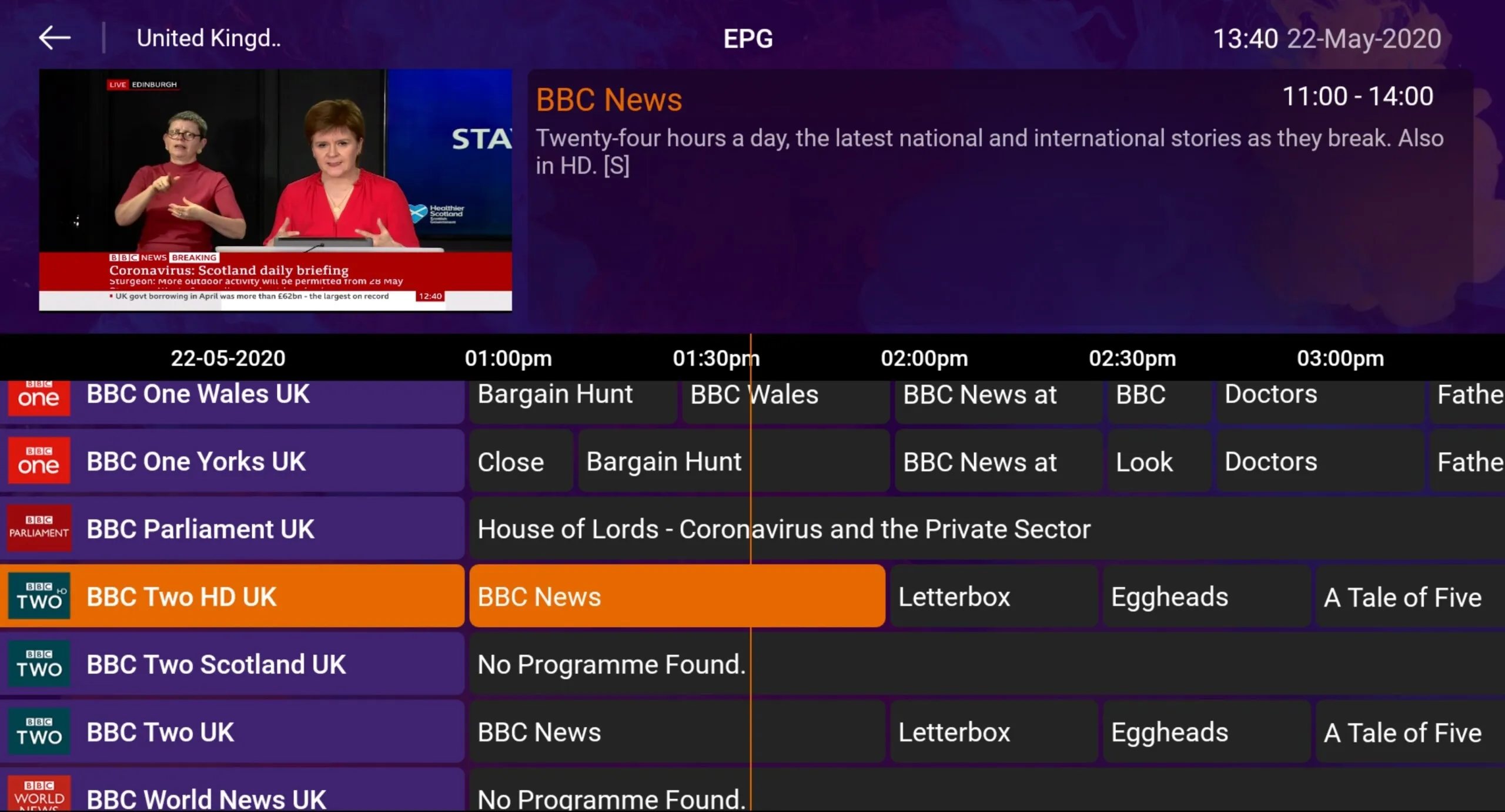 Vista EPG do IPTV Smart Purple Player com o guia de canais e a janela de pré-visualização em direto